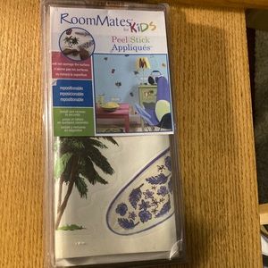 Peel & stick appliqués from roommates for kids  surf board themed.